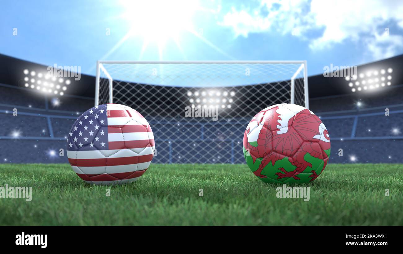 Zwei Fußballbälle in Flaggen-Farben auf Stadion hell verschwommener Hintergrund. USA und Wales. 3D Bild Stockfoto