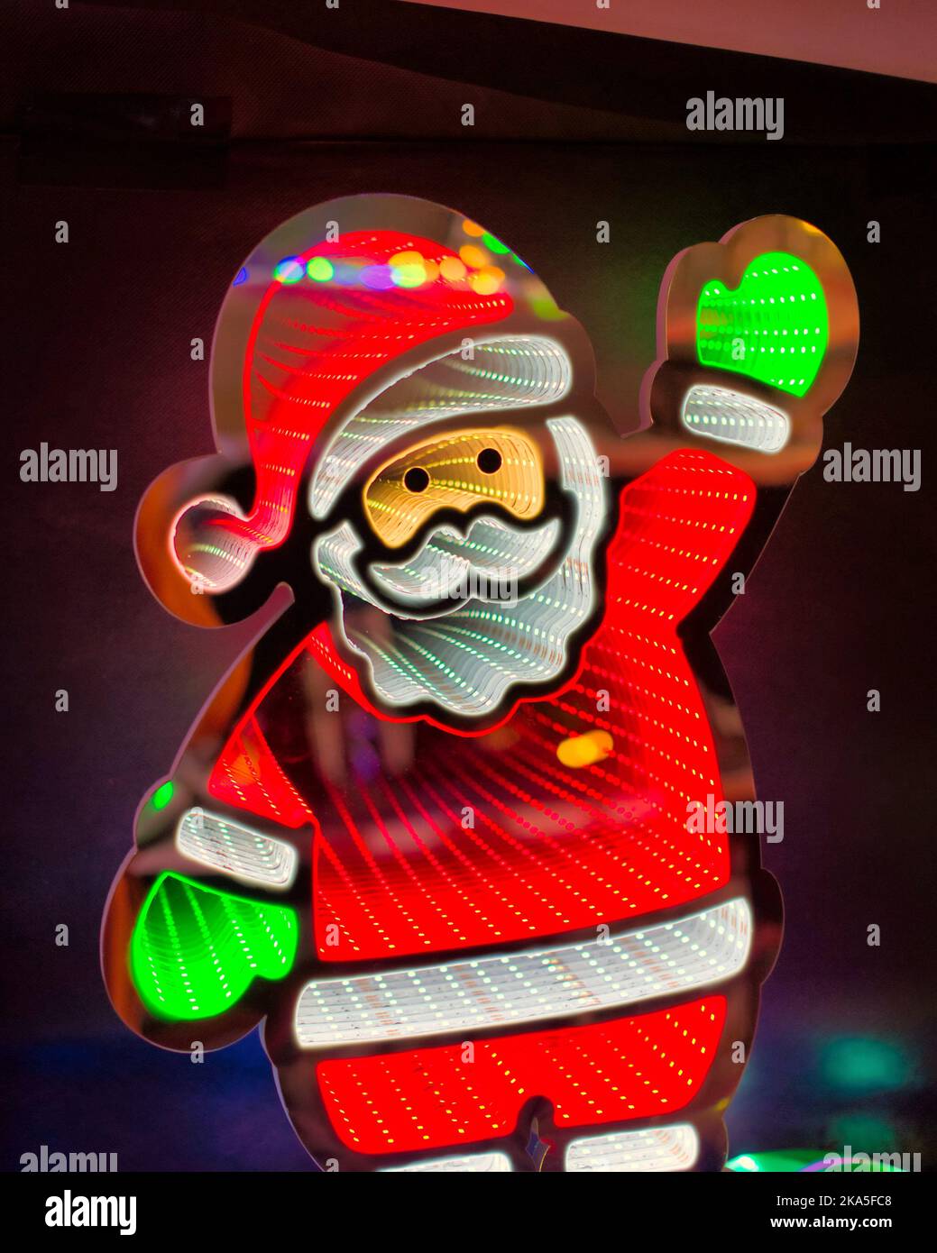 Weihnachtsdekoration Ornament Weihnachtsmann winken Stockfoto