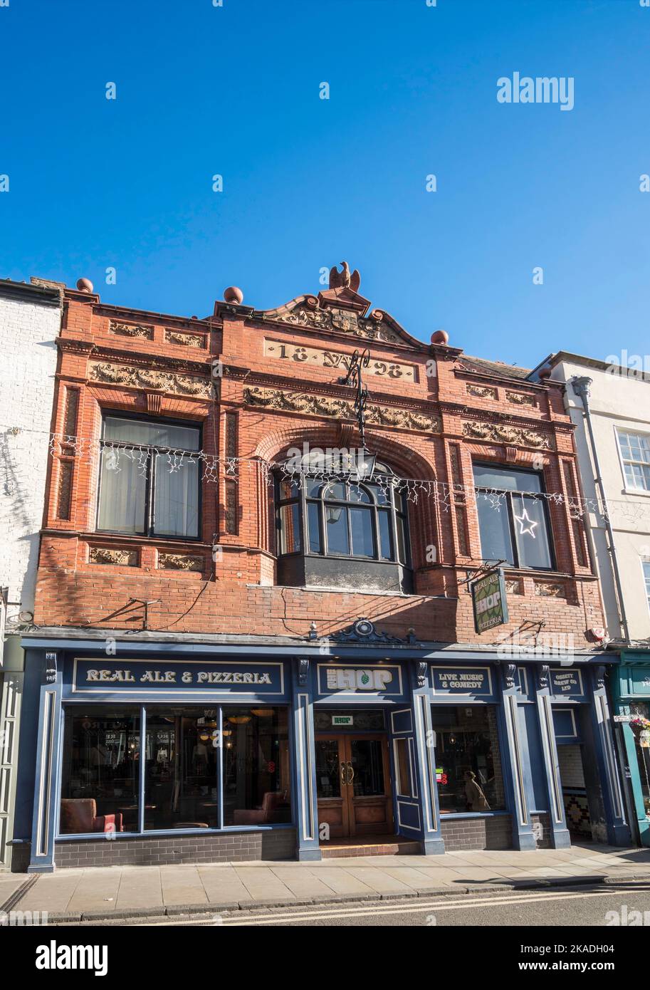11 und 12 Fossgate ein denkmalgeschütztes Gebäude, ehemaliges Geschäft, jetzt eine Bar und Restaurant The Hop in York, North Yorkshire, England, Großbritannien Stockfoto