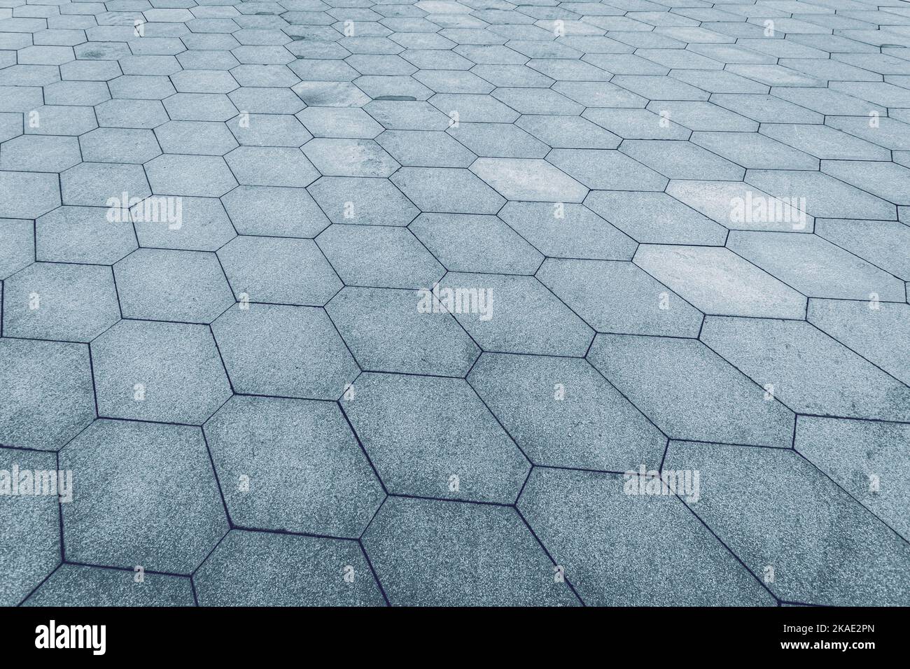 Draufsicht auf Stein Straße. Altes Pflaster Granit Textur. Straße sechseckige gepflasterten Gehweg. Zusammenfassung Hintergrund für Design. Stockfoto