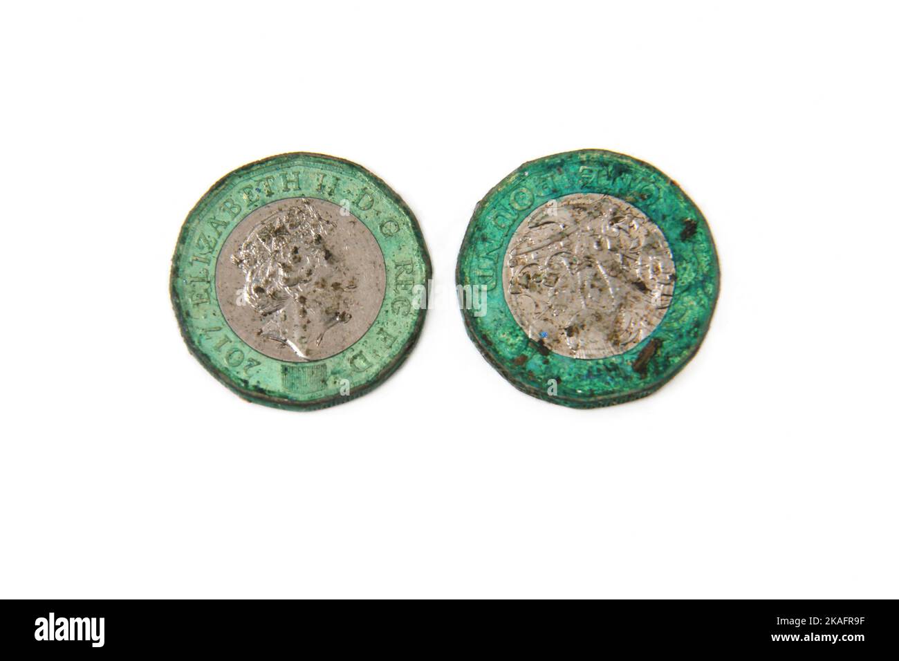 Britische Pfund-Münze wird durch Oxidation grün Stockfoto