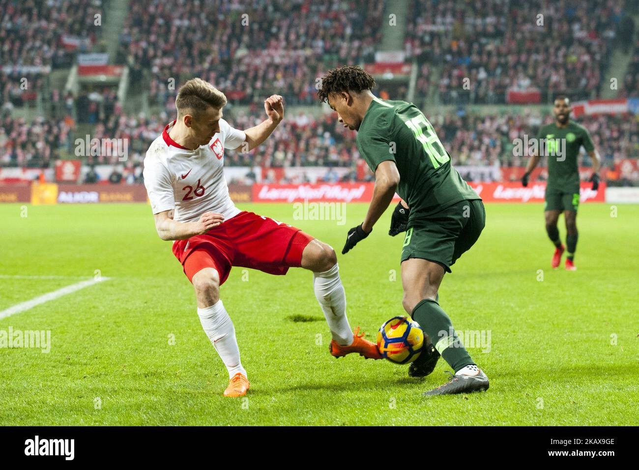 Przemyslaw Frankowski aus Polen und Alex Iwobi aus Nigeria kämpfen beim internationalen Freundschaftsspiel zwischen Polen und Nigeria am 23. März 2018 im Breslauer Stadion in Breslau, Polen, um den Ball (Foto: Andrew Surma/NurPhoto) Stockfoto