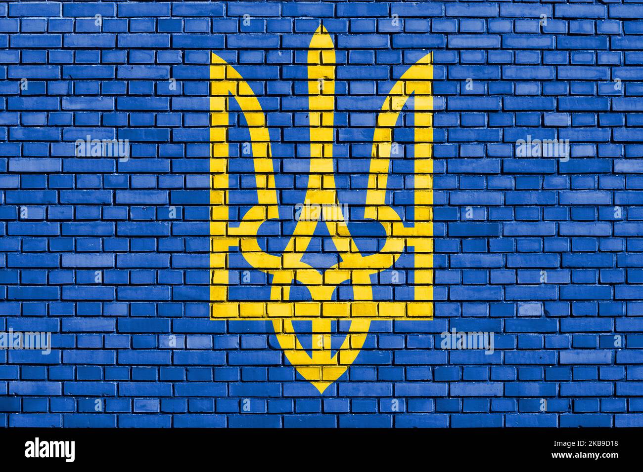Wappen der Ukraine auf Ziegelmauer gemalt Stockfoto