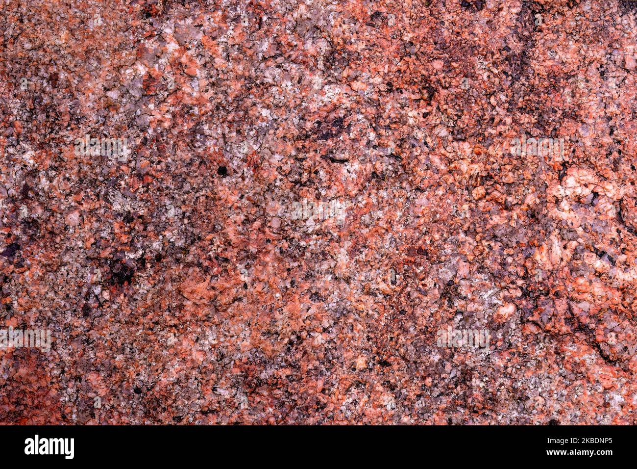 Roter Granitfelsen Nahaufnahme Hintergrund Stockfoto