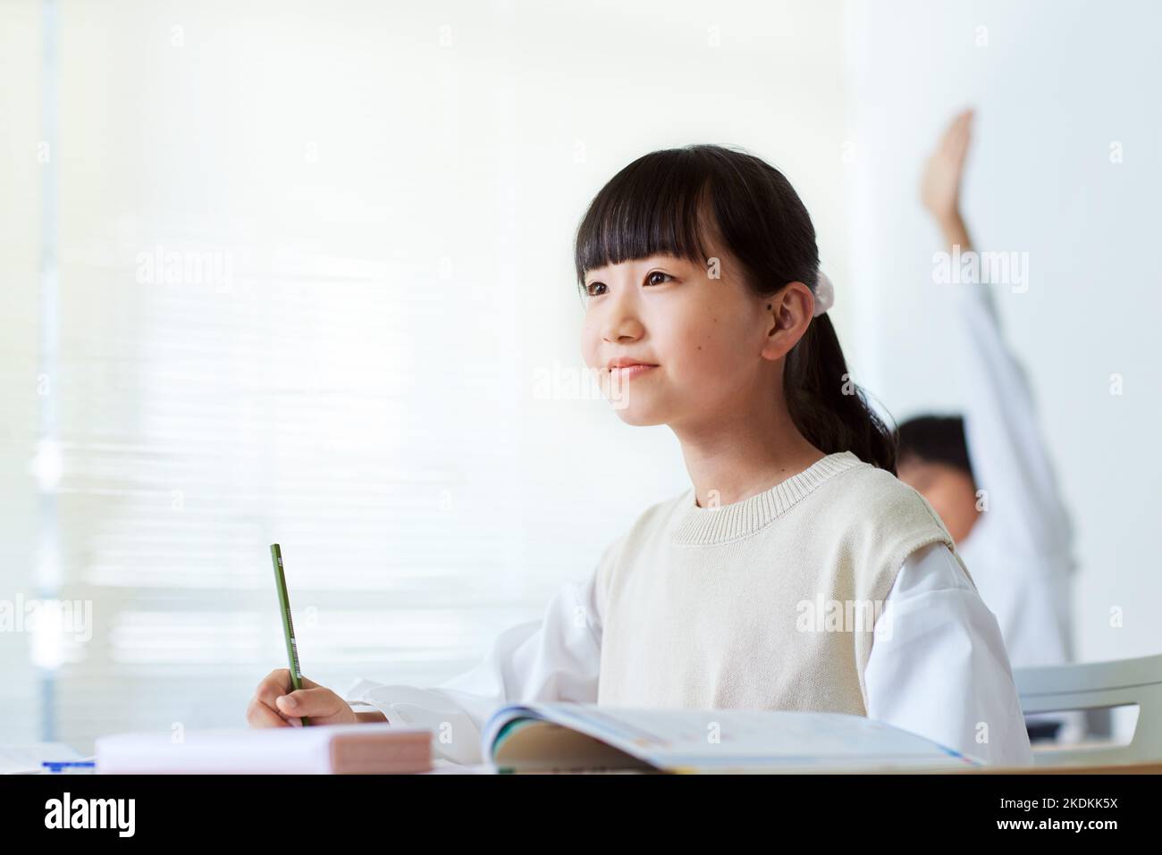 Japanisches Kind, das studiert Stockfoto