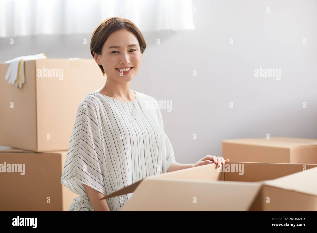 Japanische Frau zieht um Stockfoto