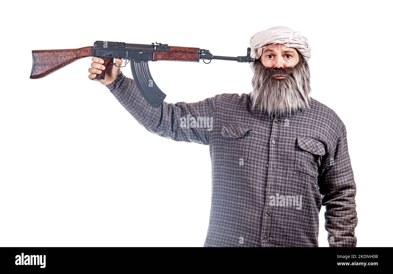 Ein bärtiger Mann hält seine Waffe an den Kopf Stockfoto