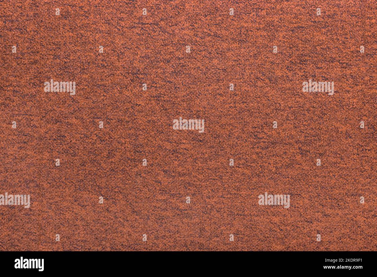 Braun-Orange Farbe Abstrakt Teppich Oberflächenstruktur Stoff Vintage Hintergrund Material Textil. Stockfoto