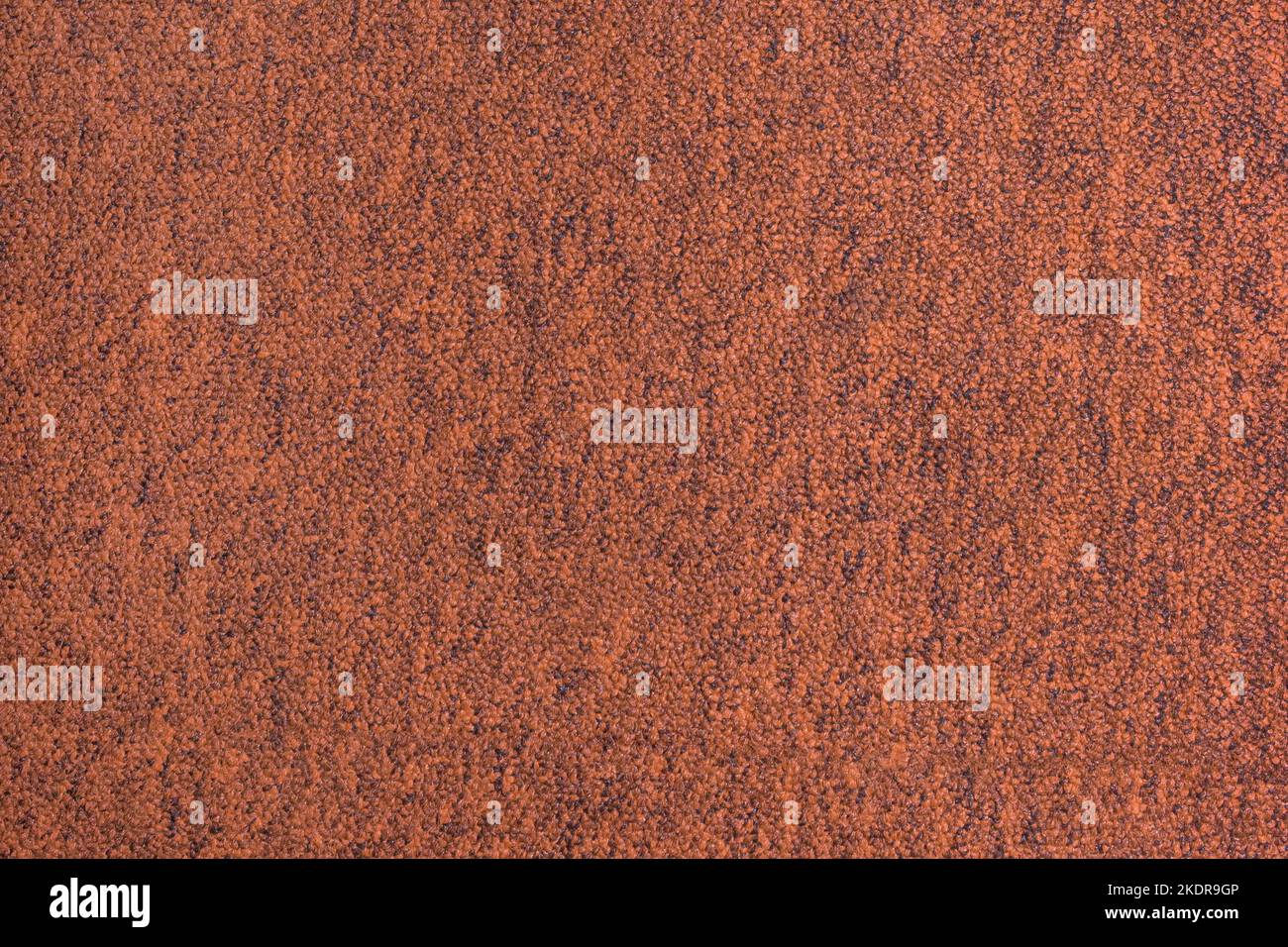 Braun-Orange Farbe Abstrakt Teppich Oberflächenstruktur Stoff Vintage Hintergrund Material Textil. Stockfoto