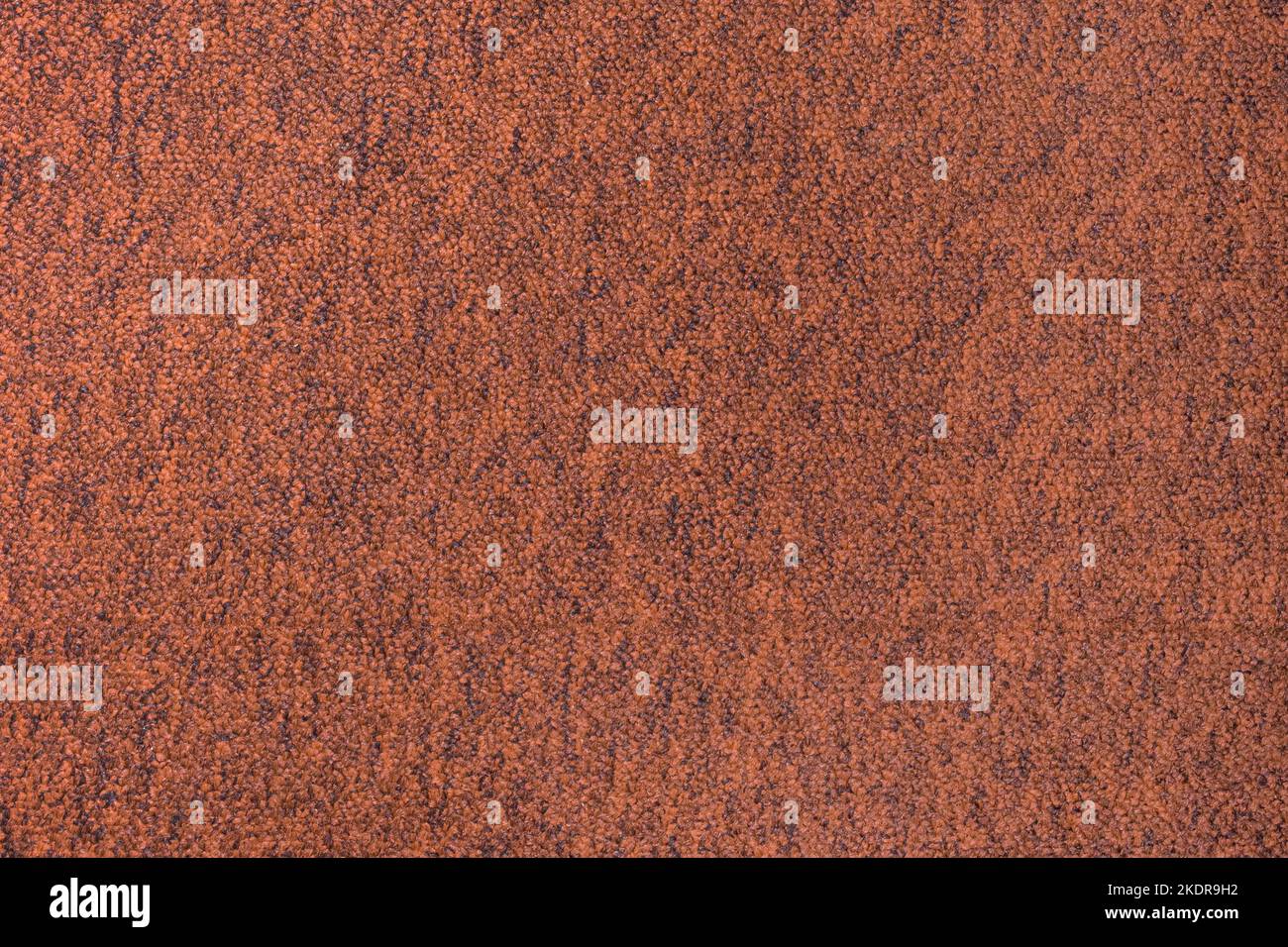 Braun-Orange Farbe Abstrakt Teppich Oberflächenstruktur Stoff Vintage Hintergrund Material Textil. Stockfoto