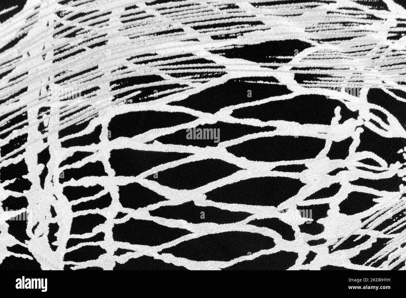 Stoff schwarz weiß Muster vintage Material Hintergrund abstraktes Design Textur Textil. Stockfoto