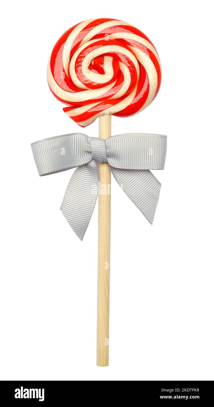 Pfefferminze Swirl Candy Cane auf einem Holzstab mit Schleife auf Weiß geschnitten. Stockfoto