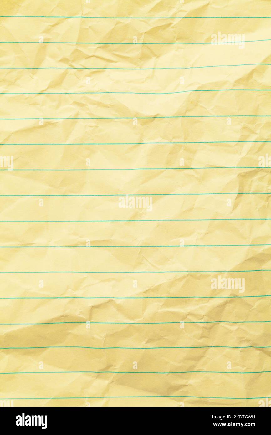 Faltig Gelb Gefüttert Notizbuch Papier Hintergrund Textur. Stockfoto