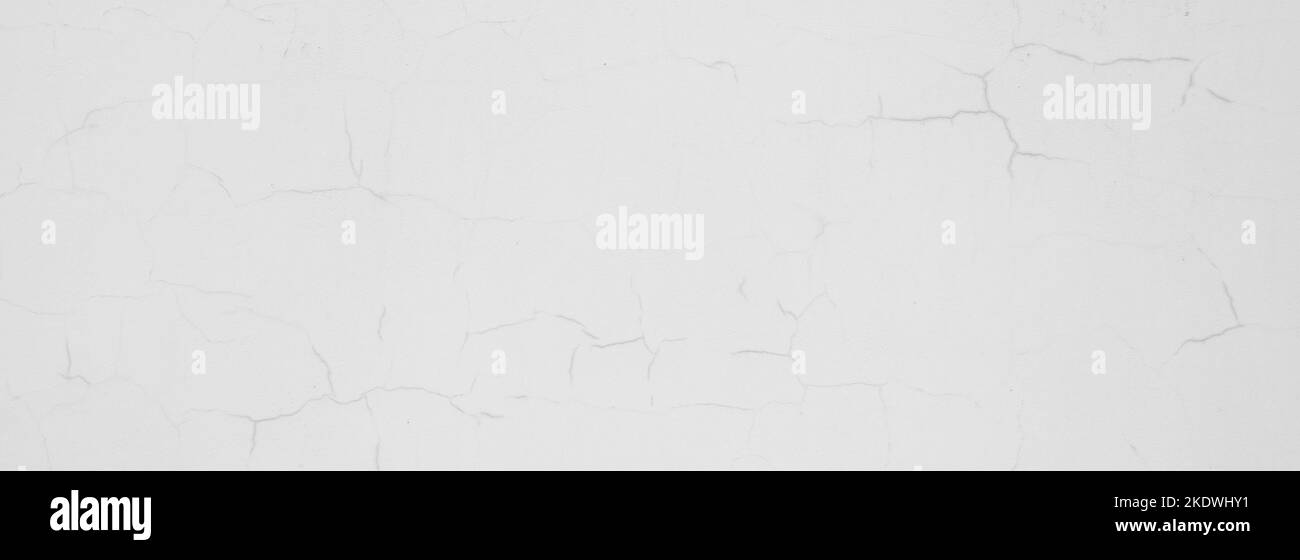 Foto von weiß bemalter Wand mit abstraktem Muster mit Kratzern Stockfoto