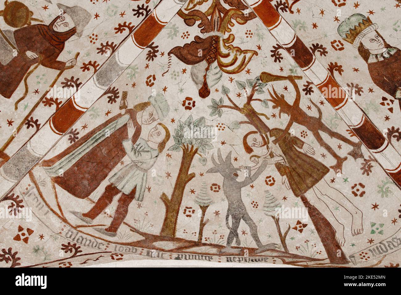Hängen von Judas an einem Baum, ein altes Fresko in der Fanefjord-Kirche, Dänemark, 10. Oktober 2022 Stockfoto Hängen von Judas an einem Baum, ein altes Fresko in der Fanefjord-Kirche, Dänemark, 10. Oktober 2022 Stockfoto