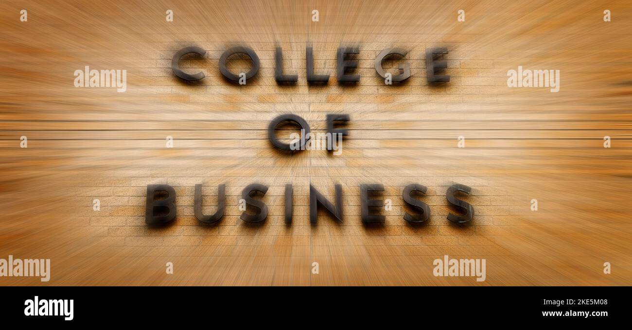 Detail des College of Business Zeichen Bildung an der Universität Brick Wall Building Zoom-Bewegung Stockfoto