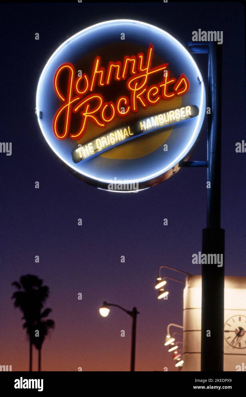 Neonschild für Johnny Rockets ein Retro-Burger-Joint auf der Melrose Avenue im Jahr 1980s, Los Angeles, CA Stockfoto
