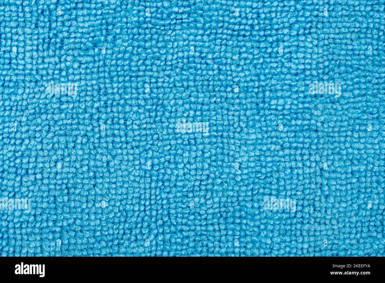 Nahaufnahme von blauem Mikrofaser- oder Mikrofasertuch, Tuch als Textur oder Hintergrund Stockfoto