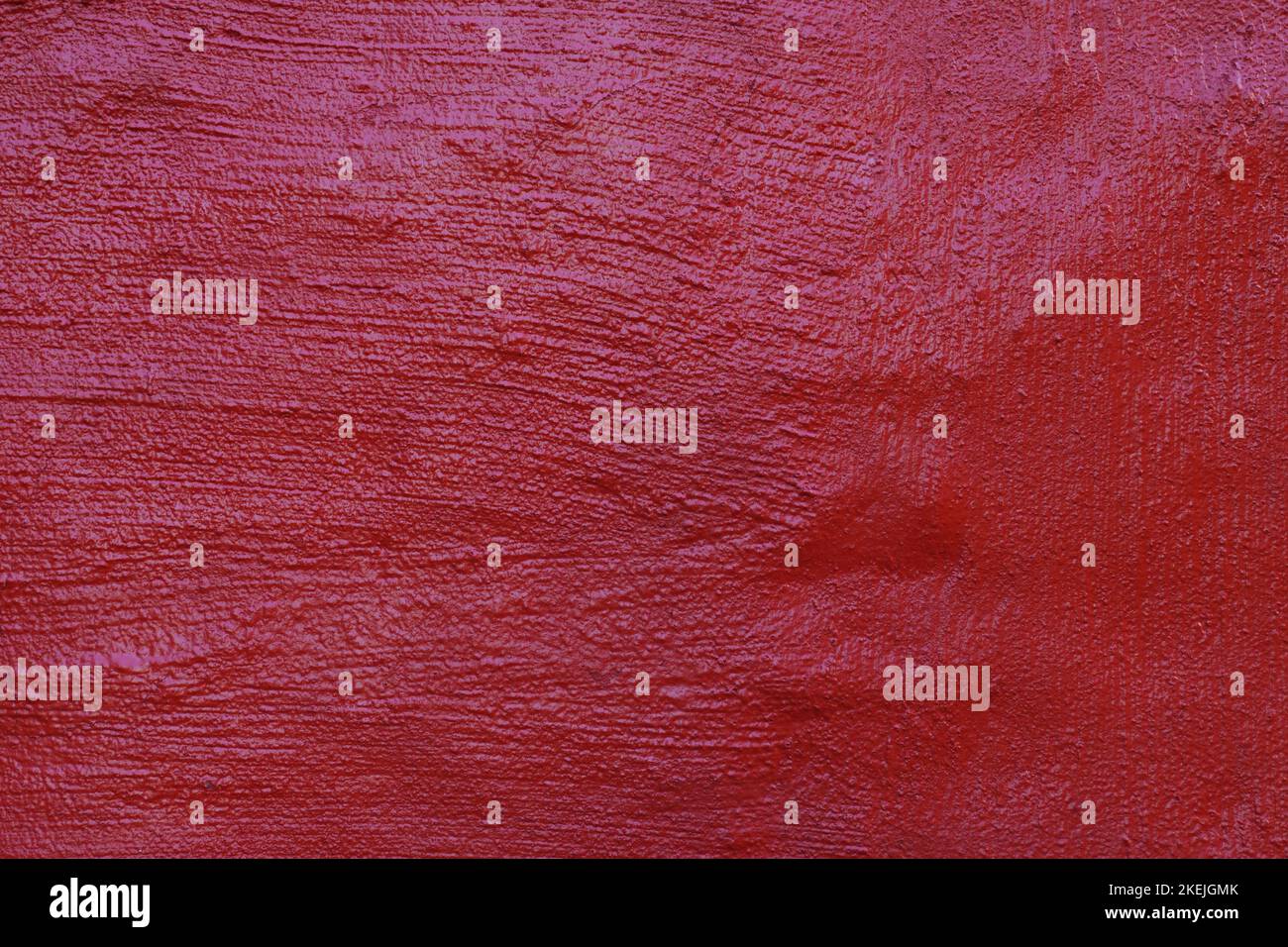 Raue Textur Wand Hintergrund dunkelrot lackiert Stockfoto