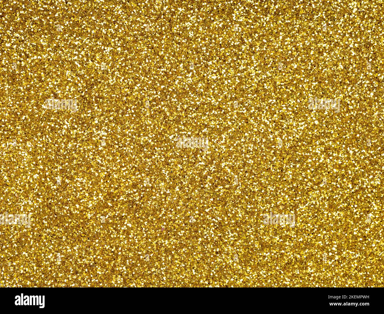 Goldener, glitzernder Glitzer. Design Muster Textur für die Dekoration und Gestaltung von Weihnachten, Neujahr, Weihnachtsgeschenk Karte oder andere Urlaubsbilder Stockfoto