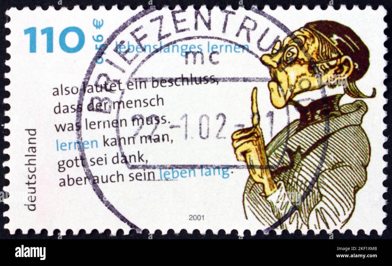 DEUTSCHLAND - UM 2001: Eine in Deutschland gedruckte Briefmarke zeigt Lehrer, lebenslanges Lernen, um 2001 Stockfoto
