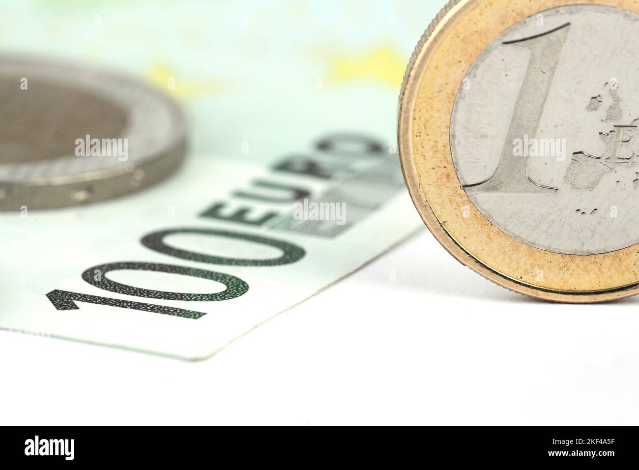 Ein Euro Münze, Banknote, 100 Euro Stockfoto