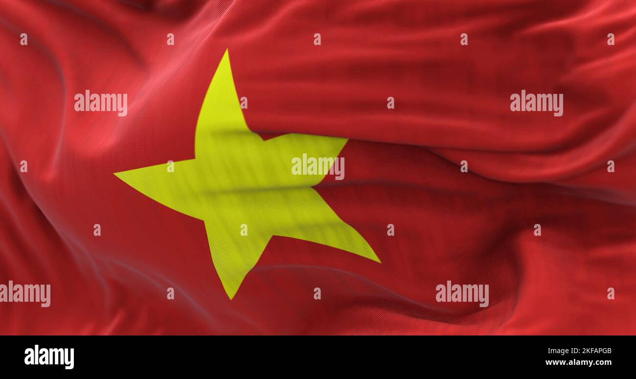 Nahaufnahme der im Wind wehenden Nationalflagge Vietnams. Die Sozialistische Republik Vietnam ist ein Land in Südostasien. Texturierter Rückenstoff Stockfoto