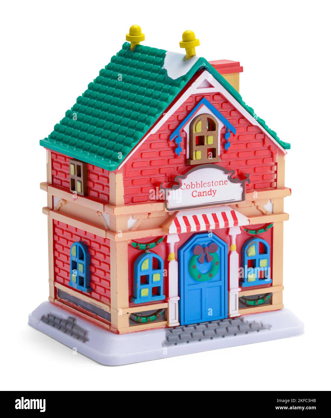 Miniatur Spielzeug Süßigkeiten Store Modell auf Weiß ausgeschnitten. Stockfoto
