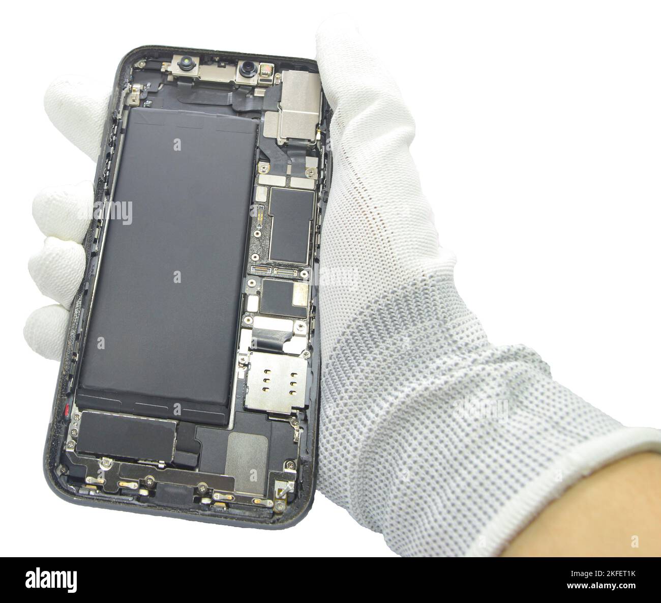 Eine Innenansicht eines Smartphones, das von einem Techniker zerlegt wurde. (Der Schnittweg ist in dieser Abbildung enthalten.) Stockfoto