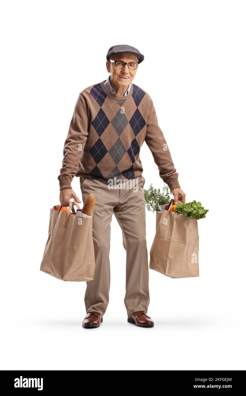 Müde ältere Mann mit zwei Lebensmitteltaschen isoliert auf weißem Hintergrund Stockfoto