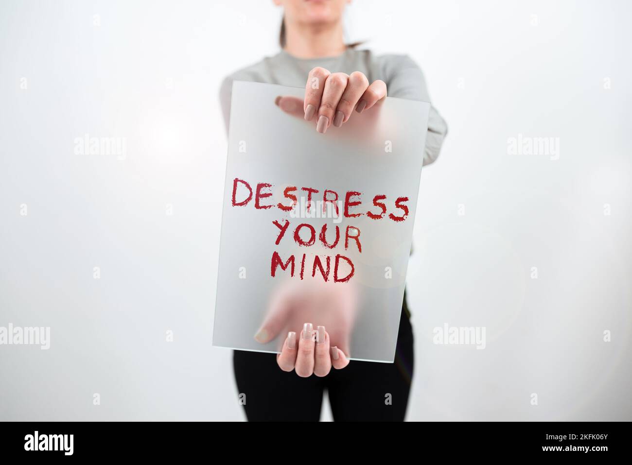 Textzeichen mit „Destress Your Mind“. Wort für, um geistige Spannungen zu lösen, Stress zu verringern Stockfoto