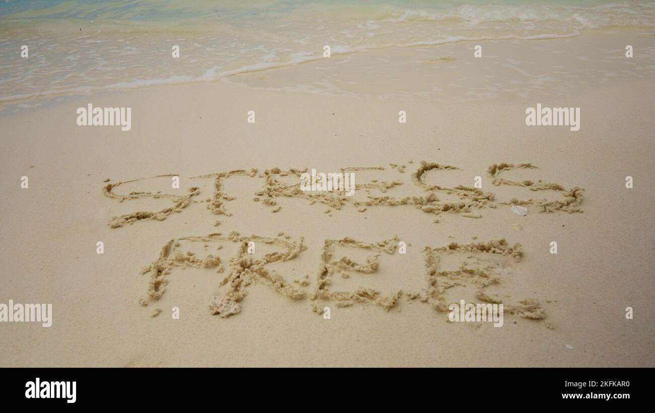 Stressfreie Zone Geschrieben Auf Sand Am Meer Am Strand Stockfoto