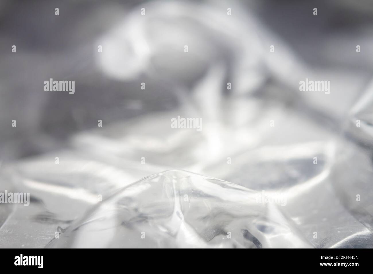 Extreme Makro der Kunststoff Luftpolsterfolie Textur. Selektiver Weichfokus, geringe Schärfentiefe. Abstrakter, verträumter Hintergrund Stockfoto