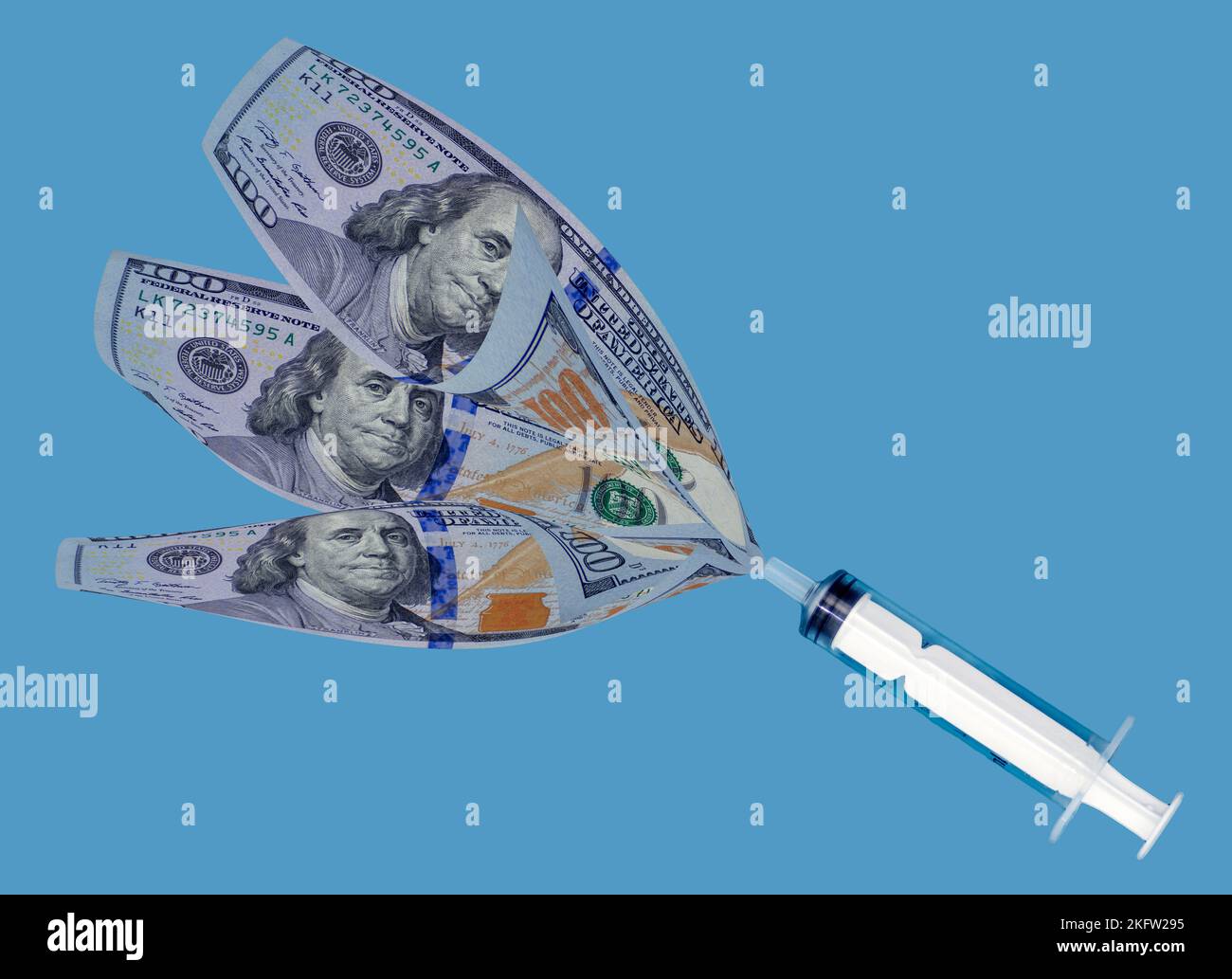 Hundert Dollar Rechnungen aus einer Spritze, Konzeptfoto Stockfoto