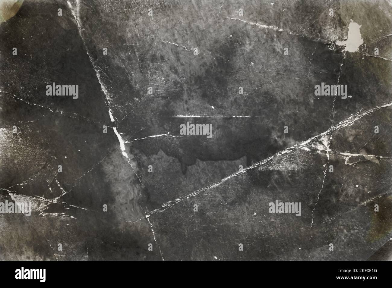 Textur und Hintergrund aus altem zerknittertem Fotopapier Stockfoto