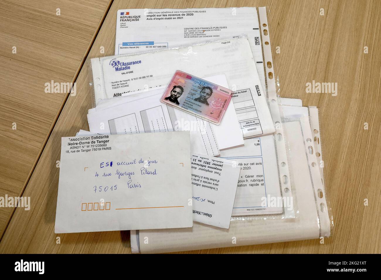 Dokumente von Migranten in Paris, Frankreich Stockfoto