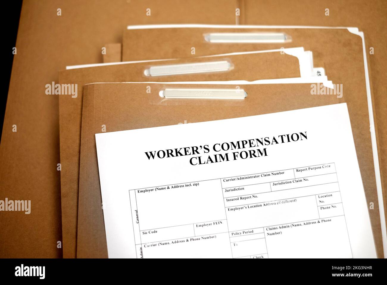 Workers Compensation Claim Form auf Dateien Beschwerde für Arbeitsunfälle Stockfoto