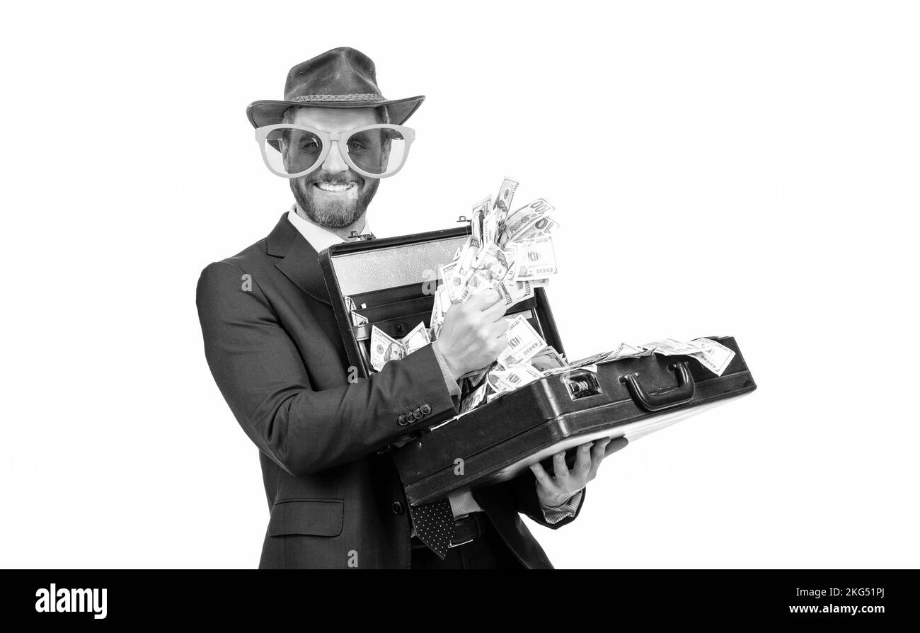 Sie gewinnen. Glücklicher Mann hält Koffer mit Geld gewinnen. Jackpot-Gewinner. Lotteriegewinn. Reichtum und Reichtum Stockfoto