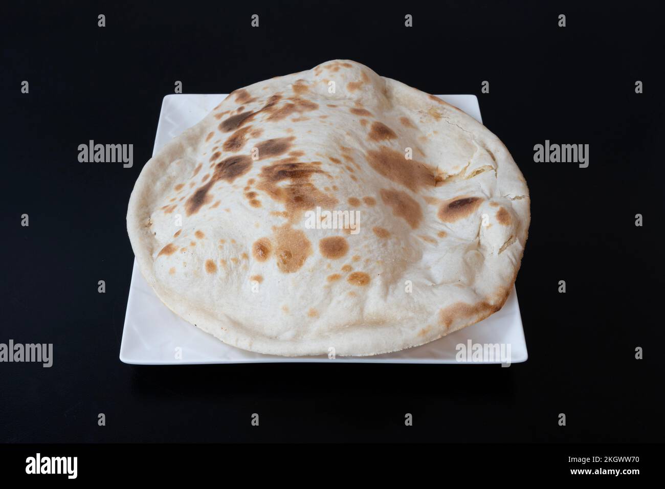 Indische Dishe kulinarisches Still Life. Naan wurde auf einem Teller serviert Stockfoto