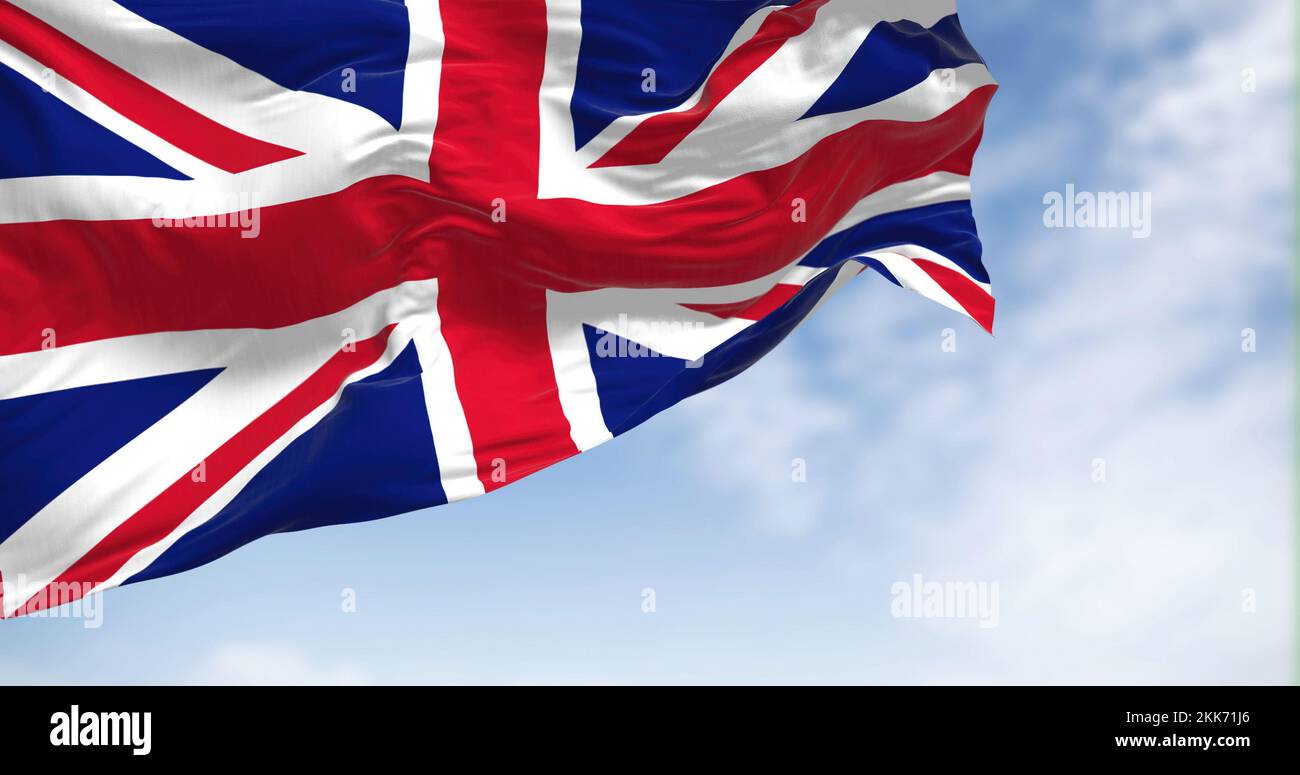 Nahaufnahme der Flagge des Vereinigten Königreichs, die im Wind weht. Das Vereinigte Königreich ist ein Inselstaat in Westeuropa . Texturierter Hintergrund. Ausw Stockfoto