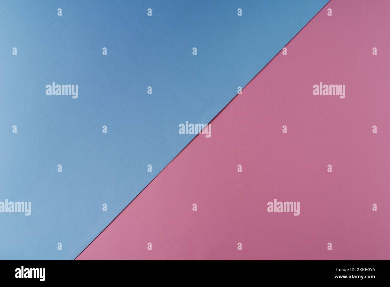 Hintergrund aus blauem und rosafarbenem Papier in Pastellfarben, geometrisches Muster Stockfoto