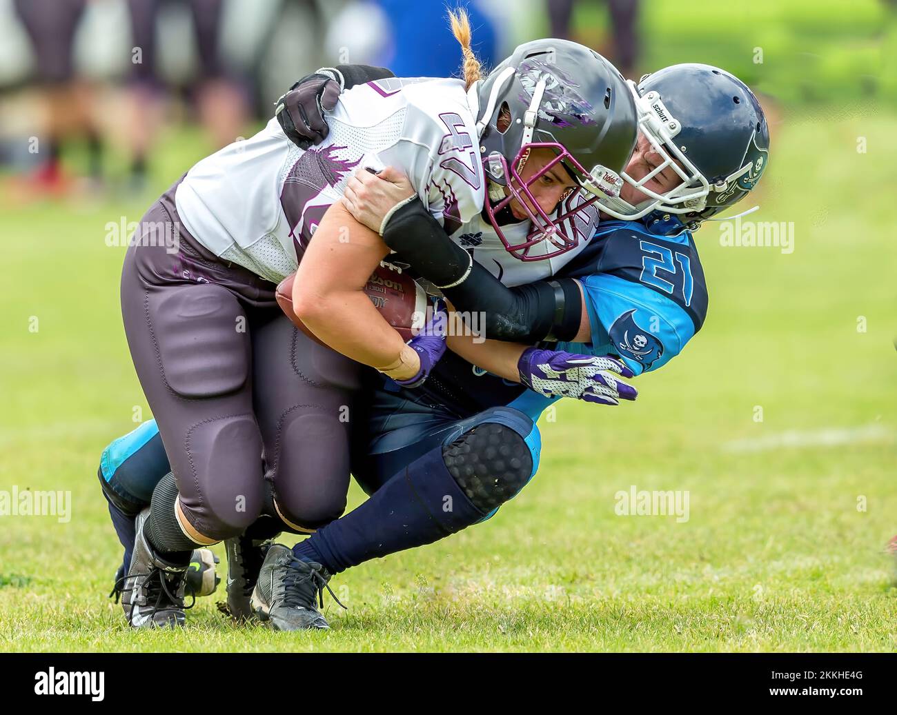 American Football Women's Action Tackle Stockfoto