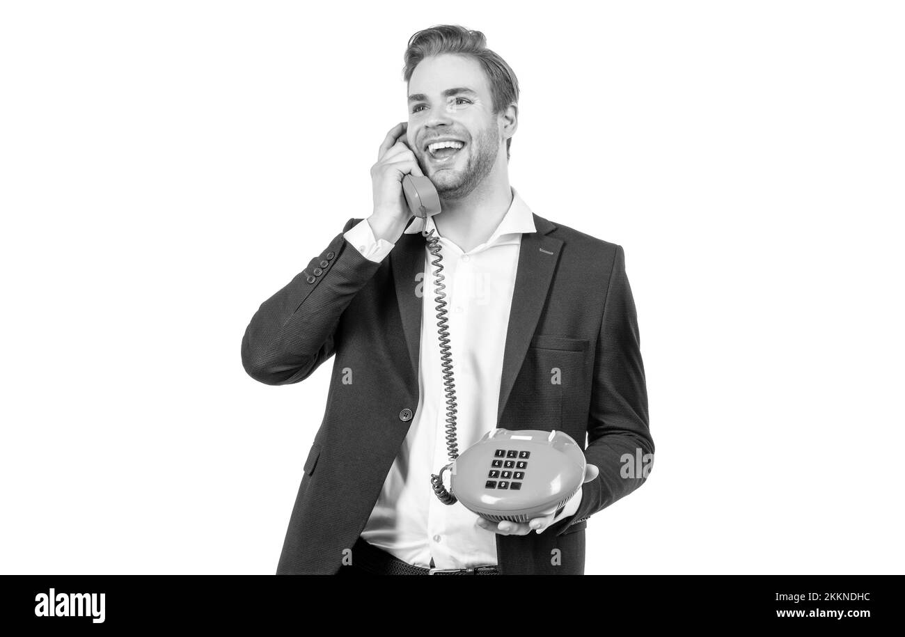 Hallo. Glücklicher Telefonanruf-Manager. Glücklicher Mann ist auf Vintage-Handy. Telefonanruf Stockfoto