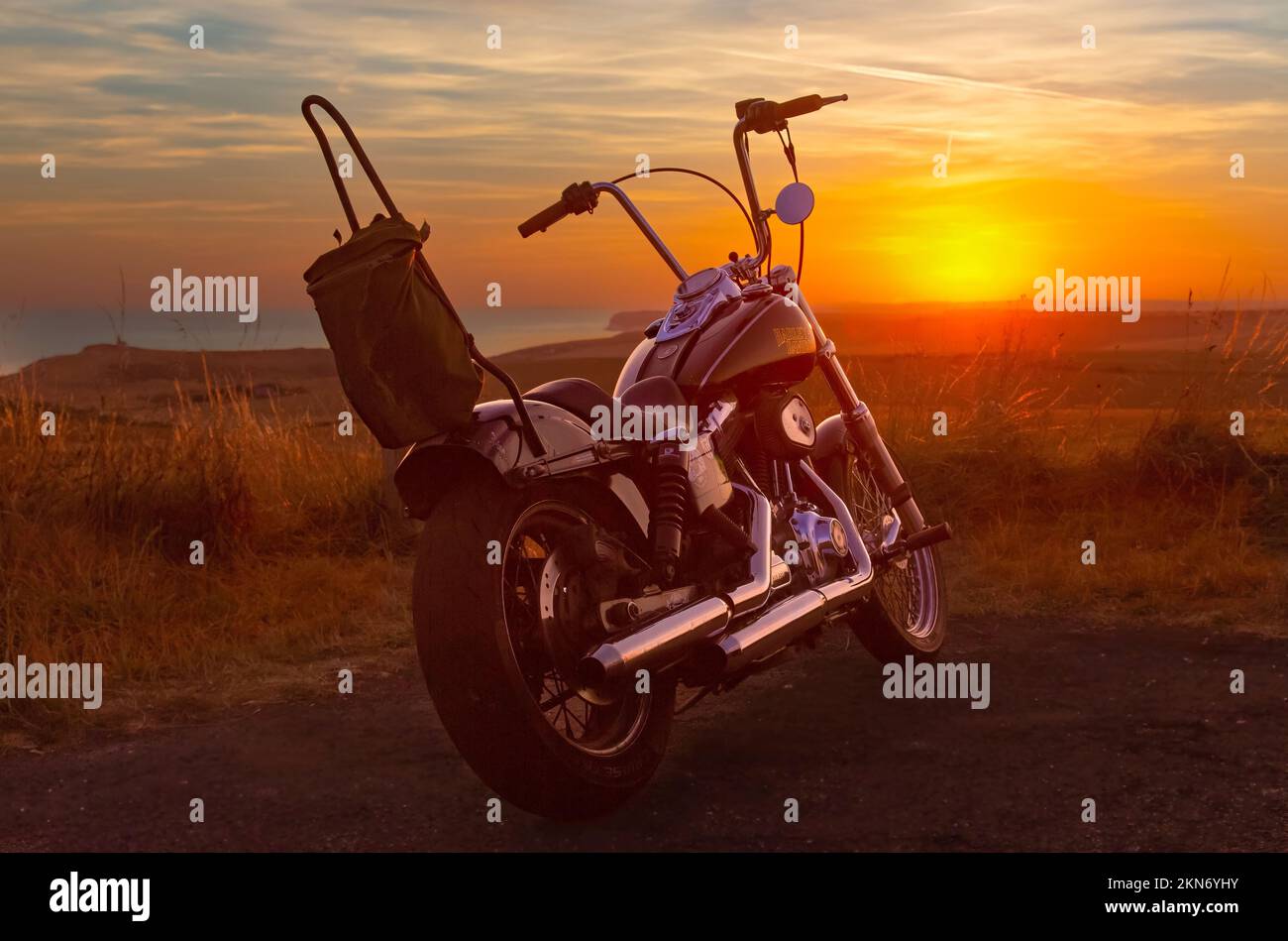 Harley-Davidson Motorcycle bei Sonnenuntergang Stockfoto