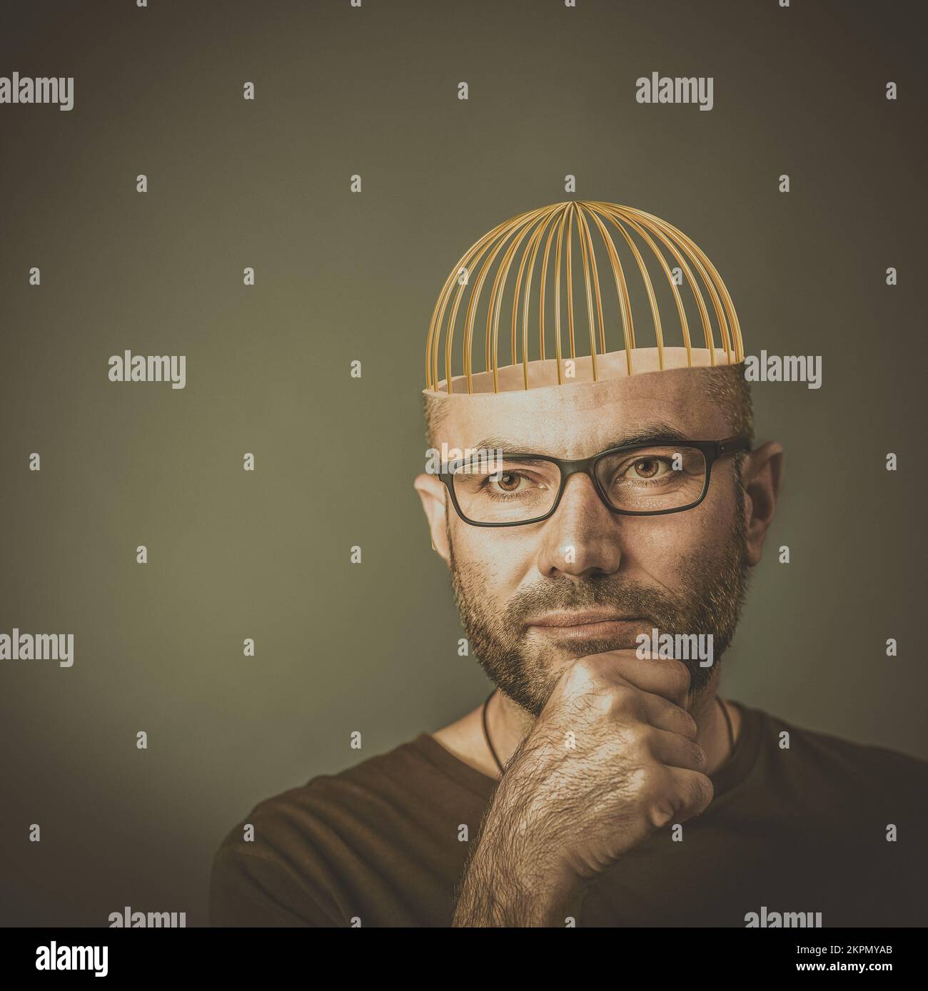 Abstraktes Porträt eines Mannes, dessen Kopf mit einem Käfig gemacht wurde. Stockfoto