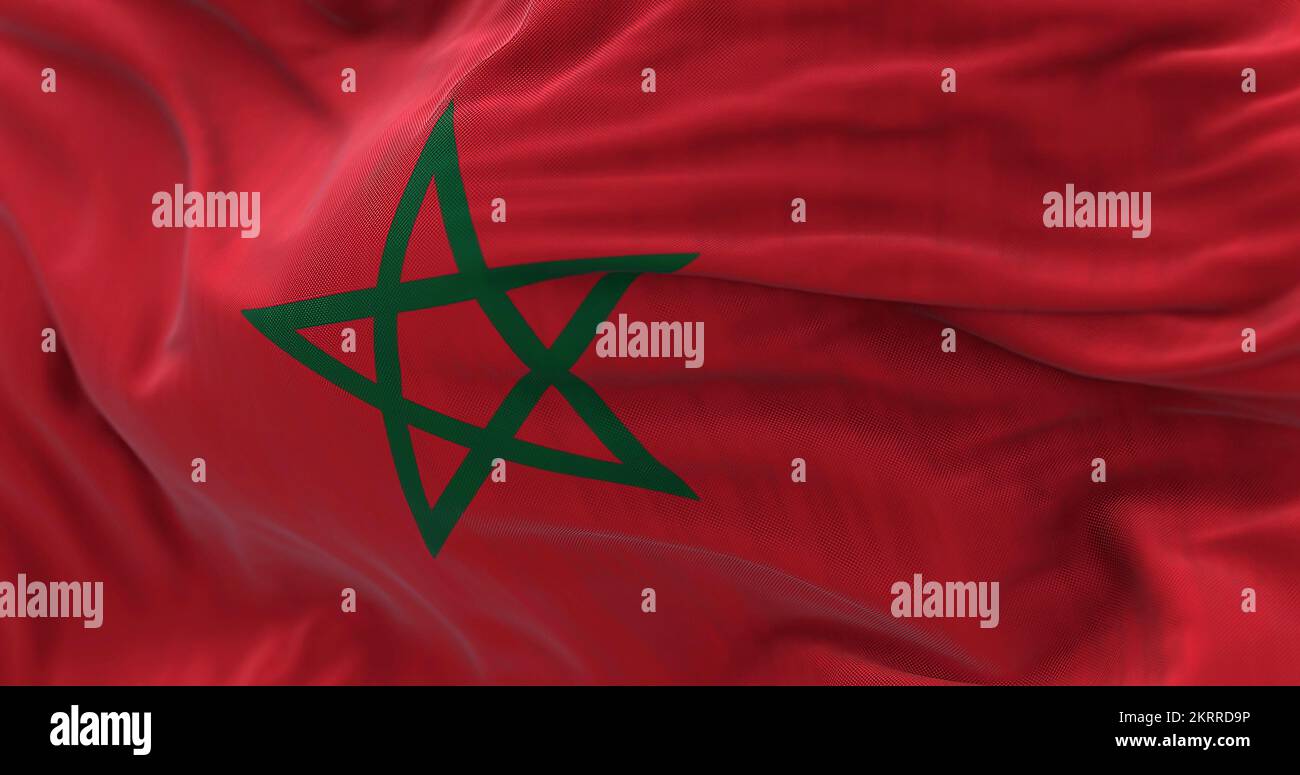 Nahaufnahme der marokkanischen Nationalflagge, die im Wind weht. Das Königreich Marokko ist ein Land im Norden Afrikas. Texturierter Hintergrund. Ausw Stockfoto
