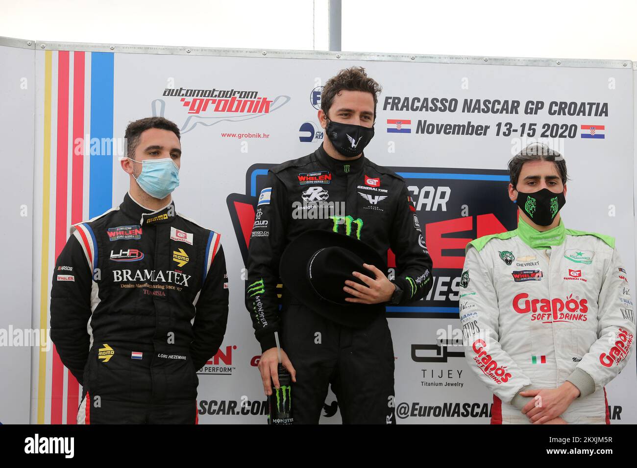RIJEKA, KROATIEN - NOVEMBER 15: Loris Hezemans, Fahrer des #50 Hendriks Motorsport, Alon Day, Fahrer des #24 Carsport und Nicolo Rocca, Fahrer der #22 DF1 Racing Pose auf der Bühne nach dem FRACASSO NASCAR GP of Croatia pro-Rennen am 15. November 2020 auf der Grobnik-Rennstrecke in Rijeka Croatia. (Foto: Goran Kovacic/Pixsell/MB Media/Getty Images) Stockfoto