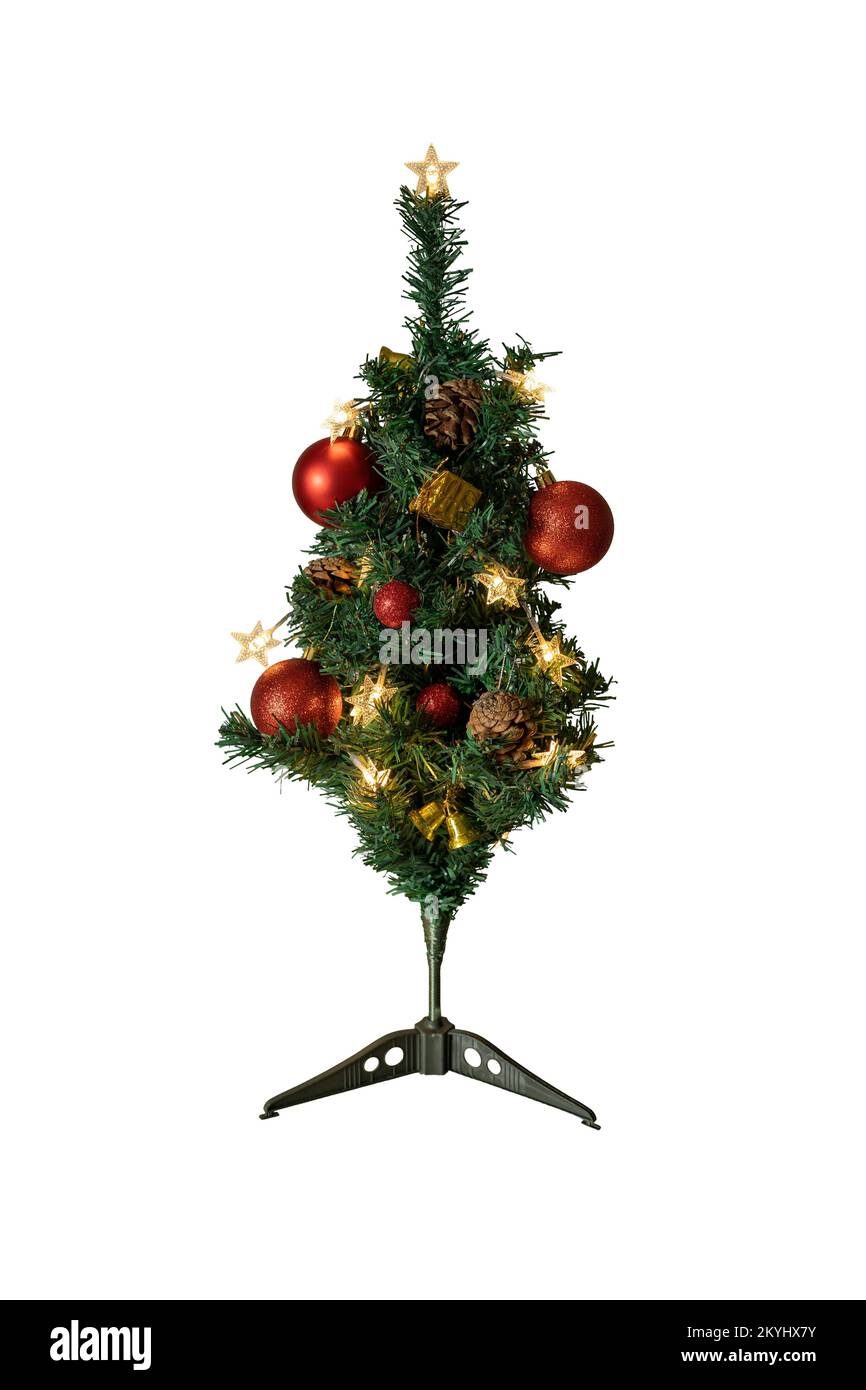 Dekorierter kleiner Weihnachtsbaum mit Schneideweg Stockfoto