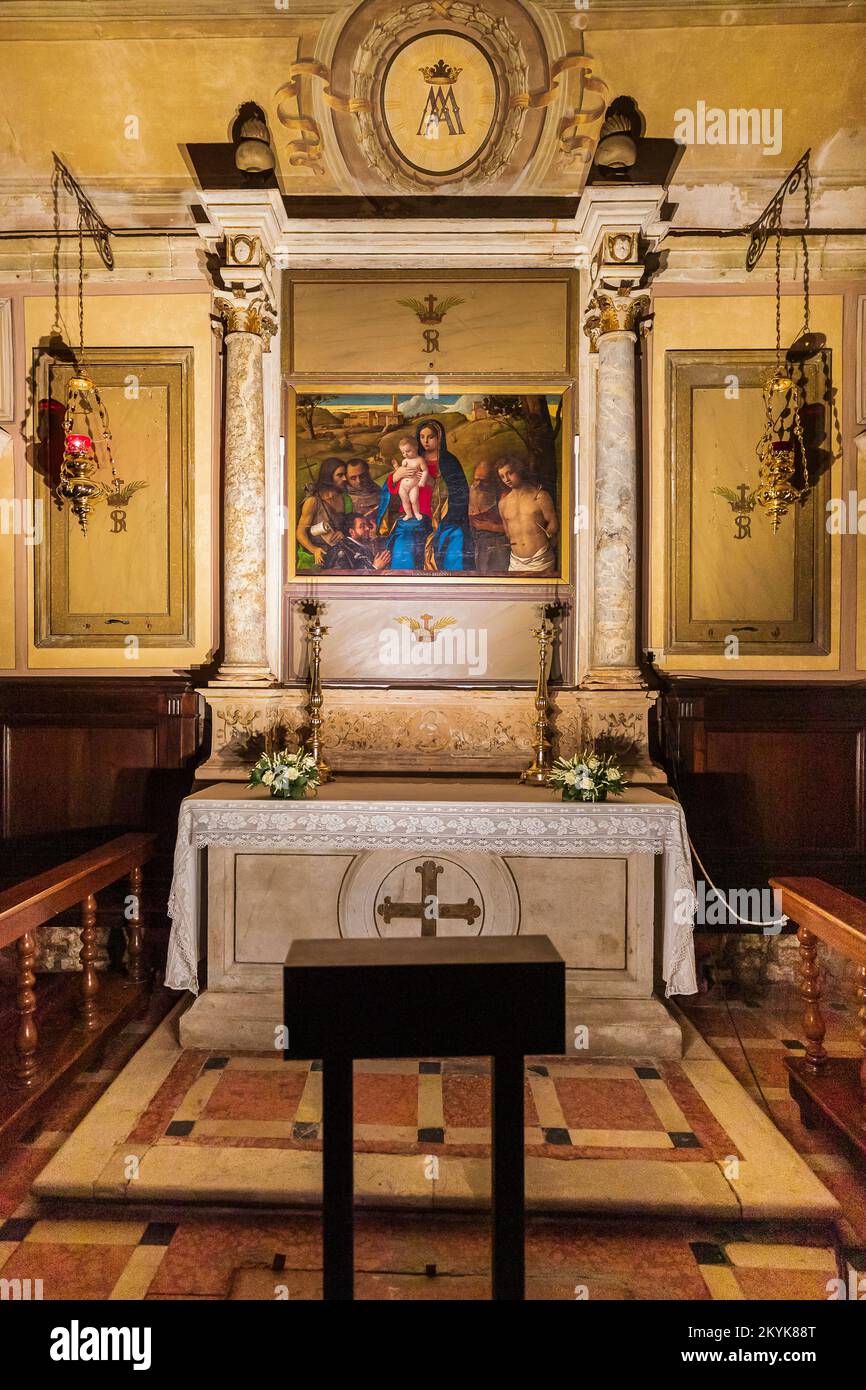 Italien Venetien - Kirche San Francesco della Vigna (1554) - Heilige Kapelle - Giovanni Bellini - "Madonna und Kind mit vier Heiligen und Spender" Stockfoto