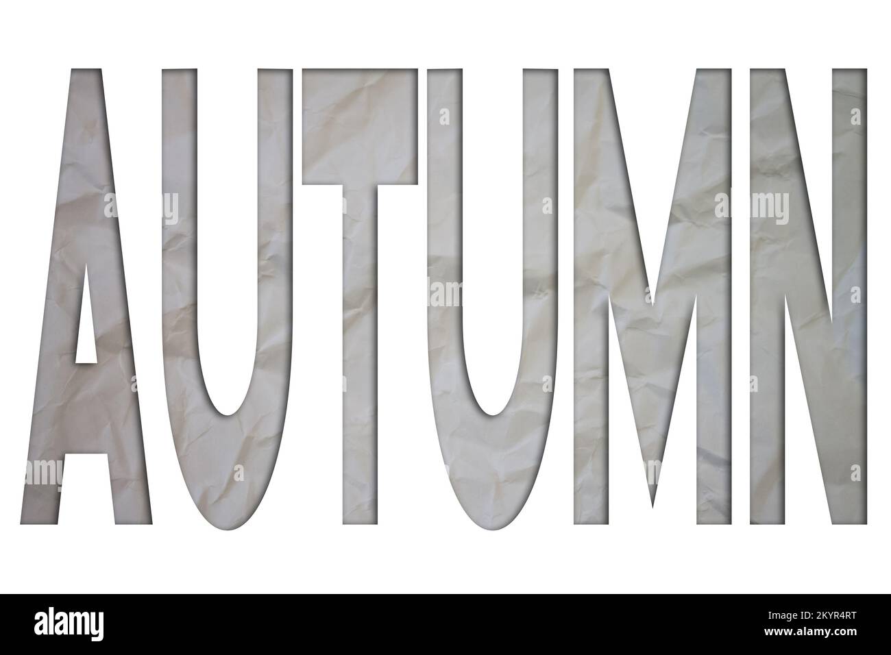 Herbsttext mit zerrissenem, zerknittertem Weißbuch auf farbigem Hintergrund. Stockfoto